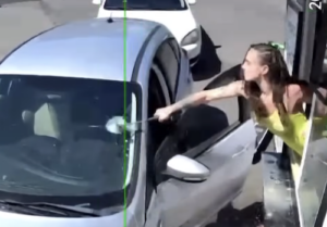 Seattle Bikini Barista Shatters Customer Windshield with Hammer Caught on Camera. Credit King 5 Seattle