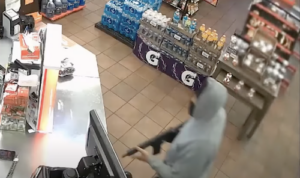 Man Armed With Rifle, Sledgehammer Wanted in Multiple Robberies Caught on Camera. Credit WREG News Channel 3