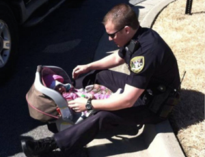 Dunwoody Police Officers Changing Diapers Caught on Camera. Credit DPD