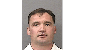 Jeffrey Bembry Arrested for Allegedly Pointing Assault Rifle at CHP Officer Caught on Camera. Credit Shasta County Sheriff's Office